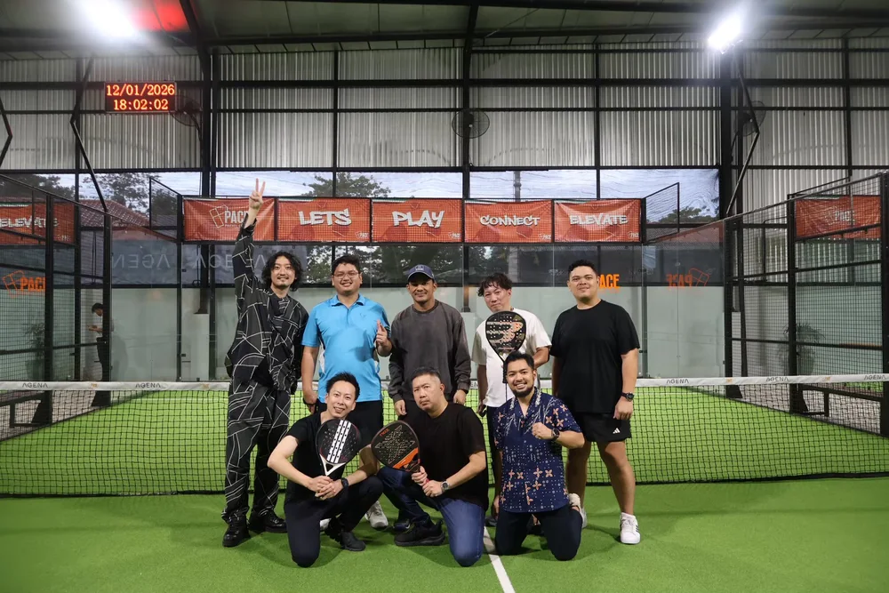 Indonesian and Japanese participants posing after a padel game
